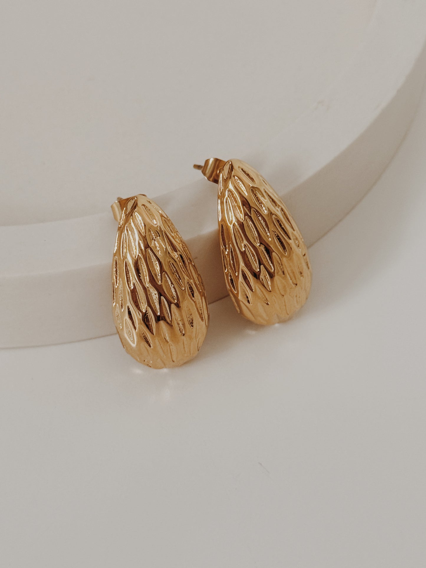 Brincos Gota martelada