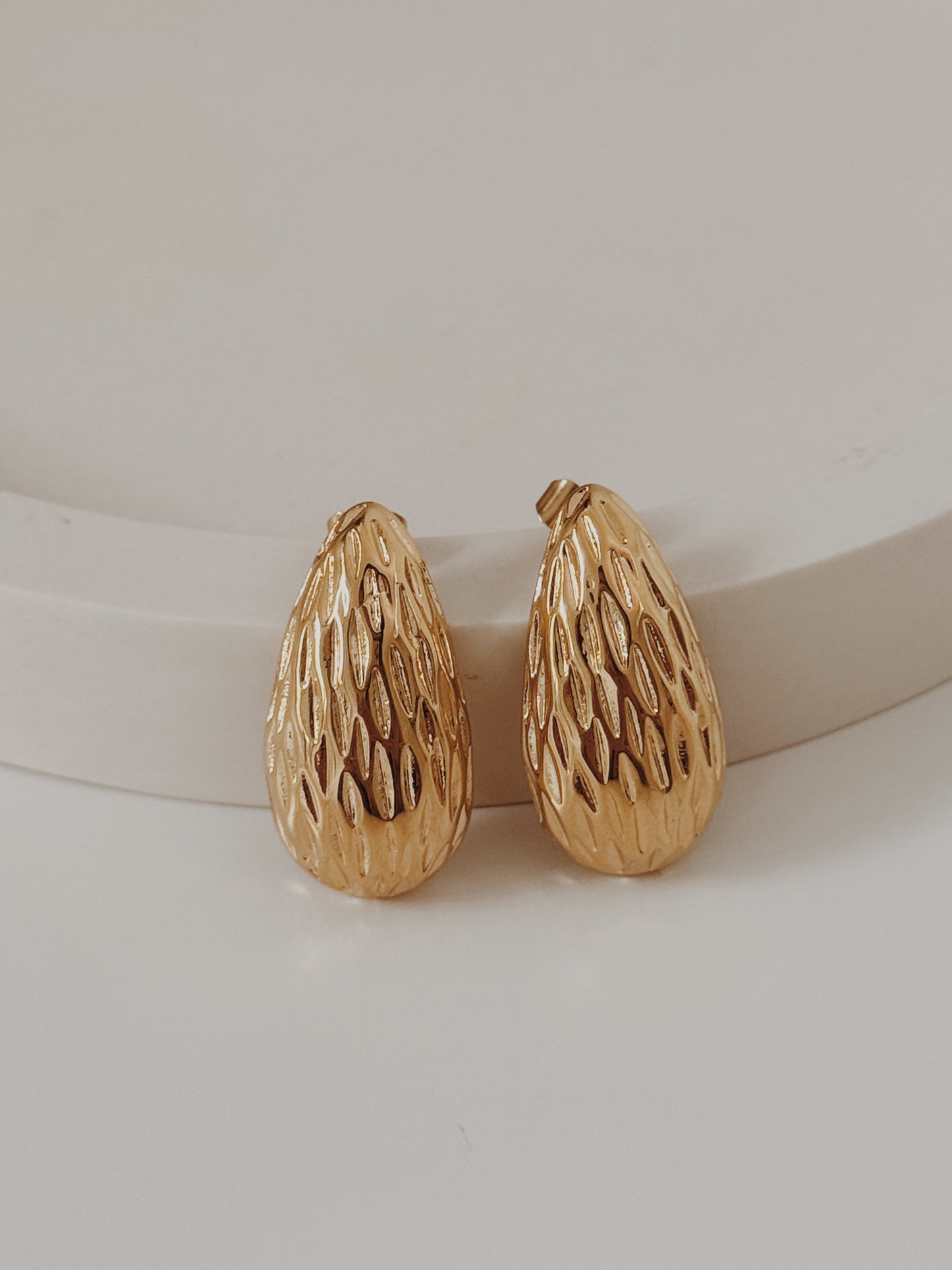 Brincos Gota martelada
