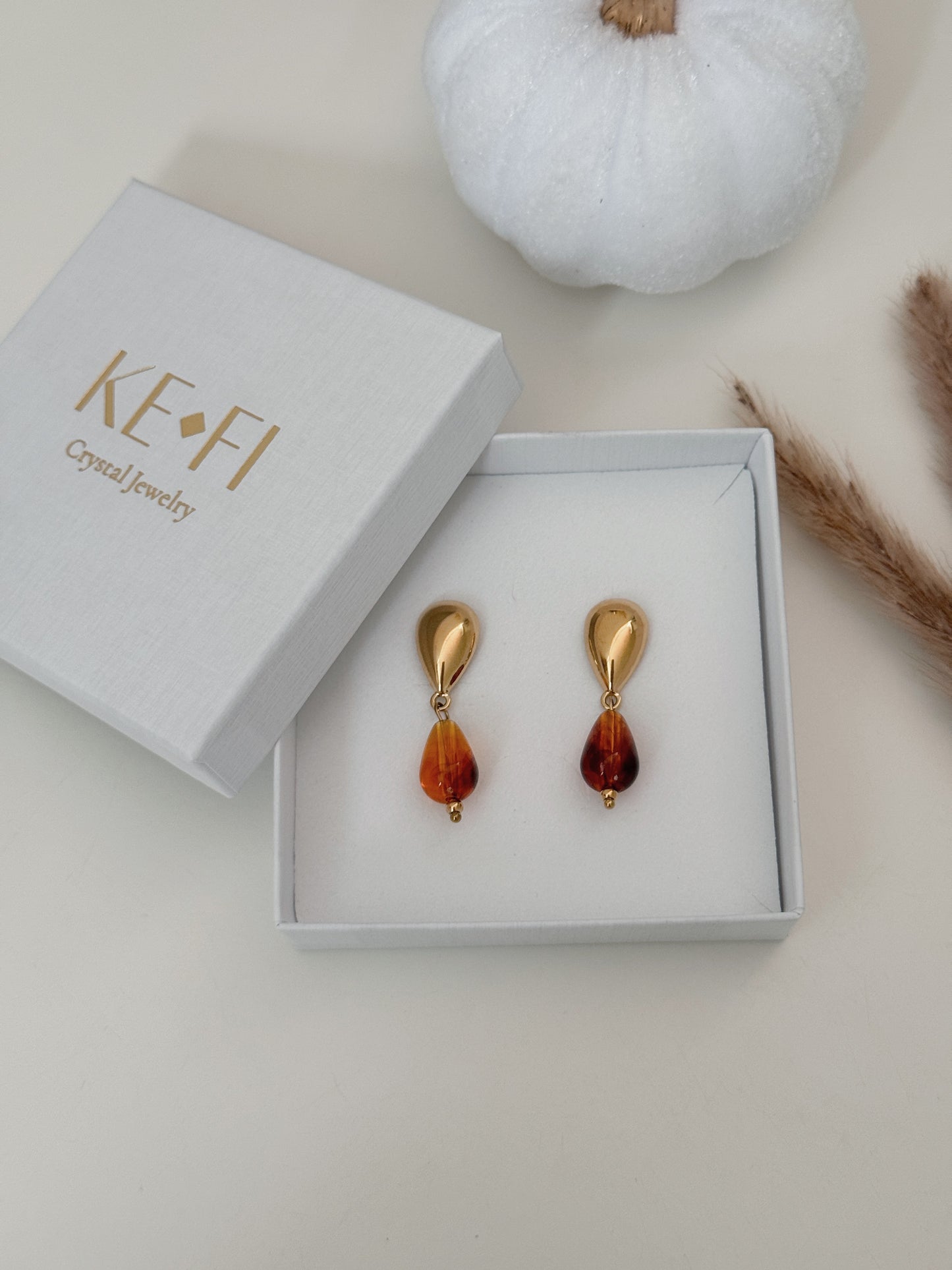 Brincos gota Âmbar