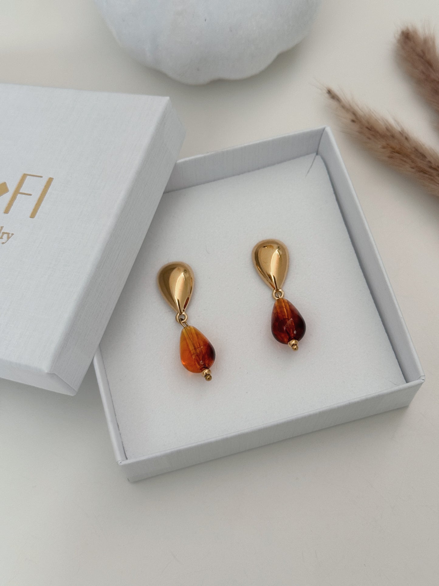 Brincos gota Âmbar