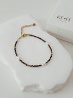 Pulseira Olho de Tigre | pérola  água doce
