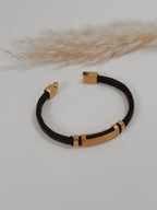 Pulseira homem dourada couro preto