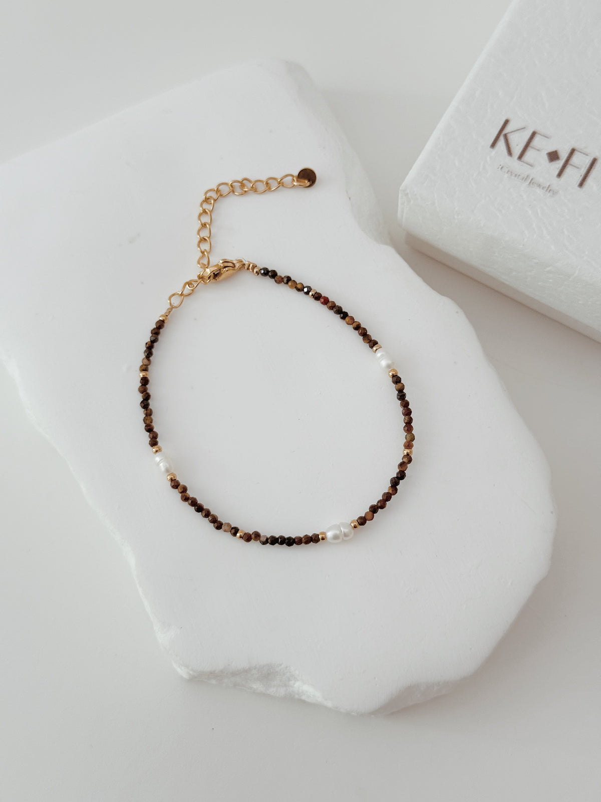 Pulseira Olho de Tigre | pérola  água doce