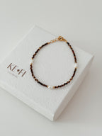 Pulseira Olho de Tigre | pérola  água doce