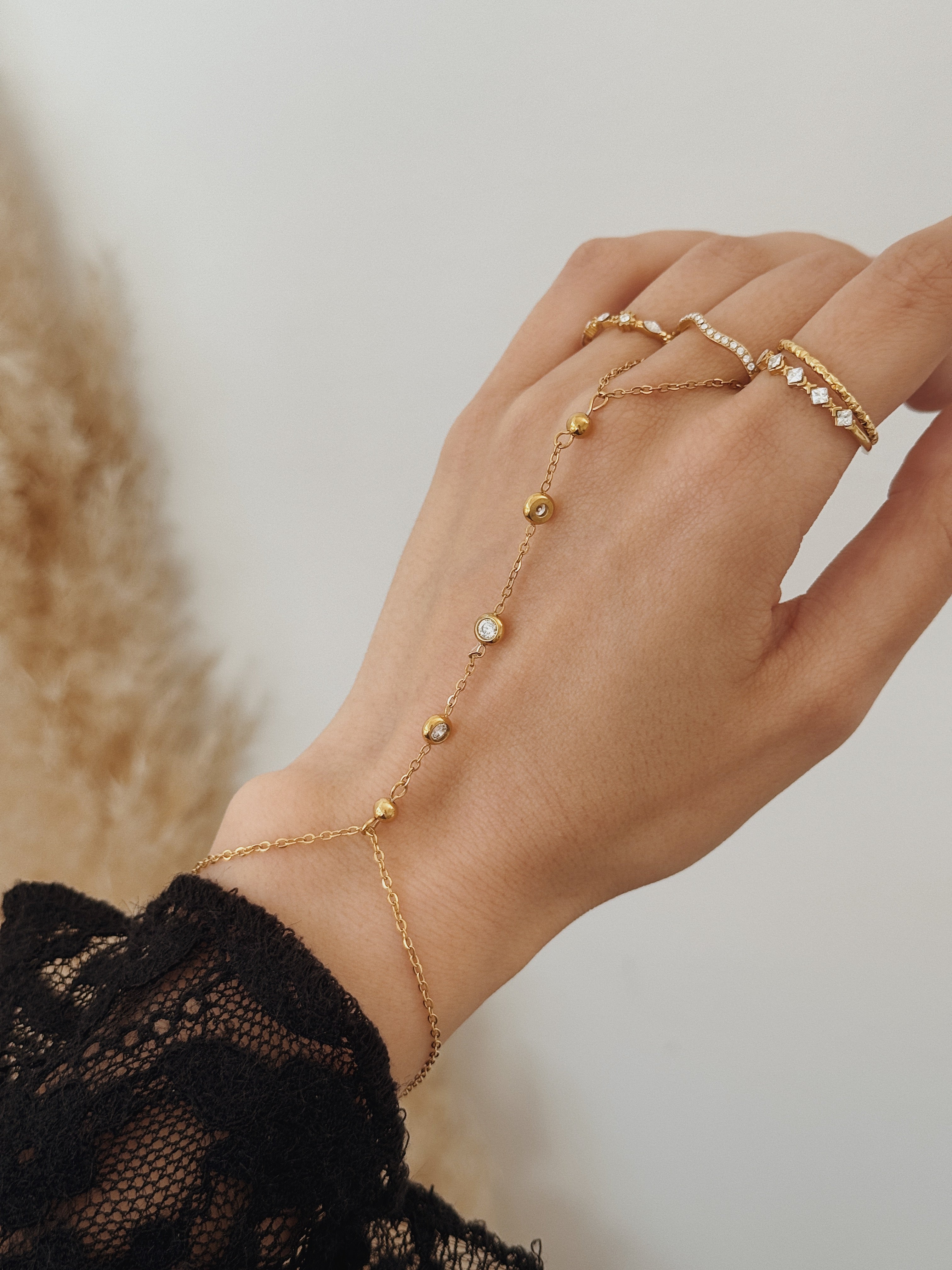 Pulseira de mão Lyra