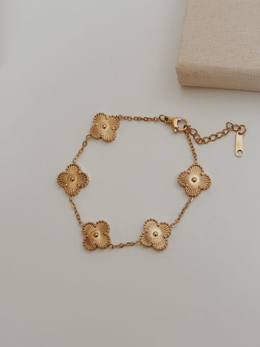 Pulseira trevos dourada