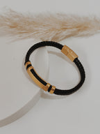 Pulseira homem dourada couro preto